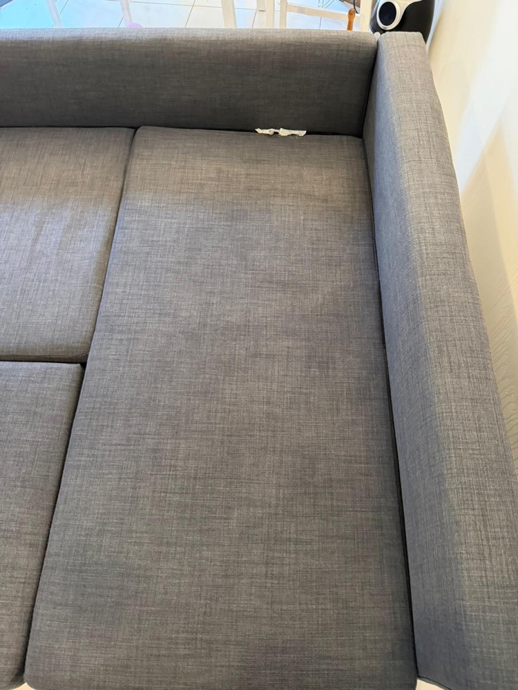 Grey sofa bed clean and even after steam cleaning