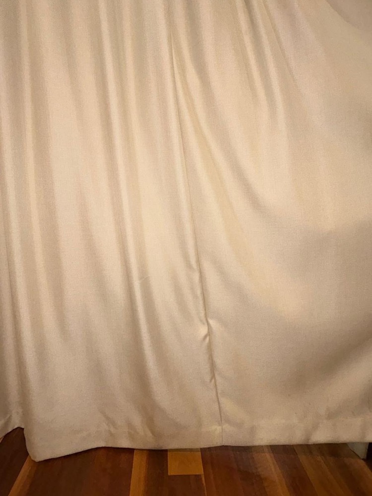 Same curtain hem clean and stain-free after cleaning