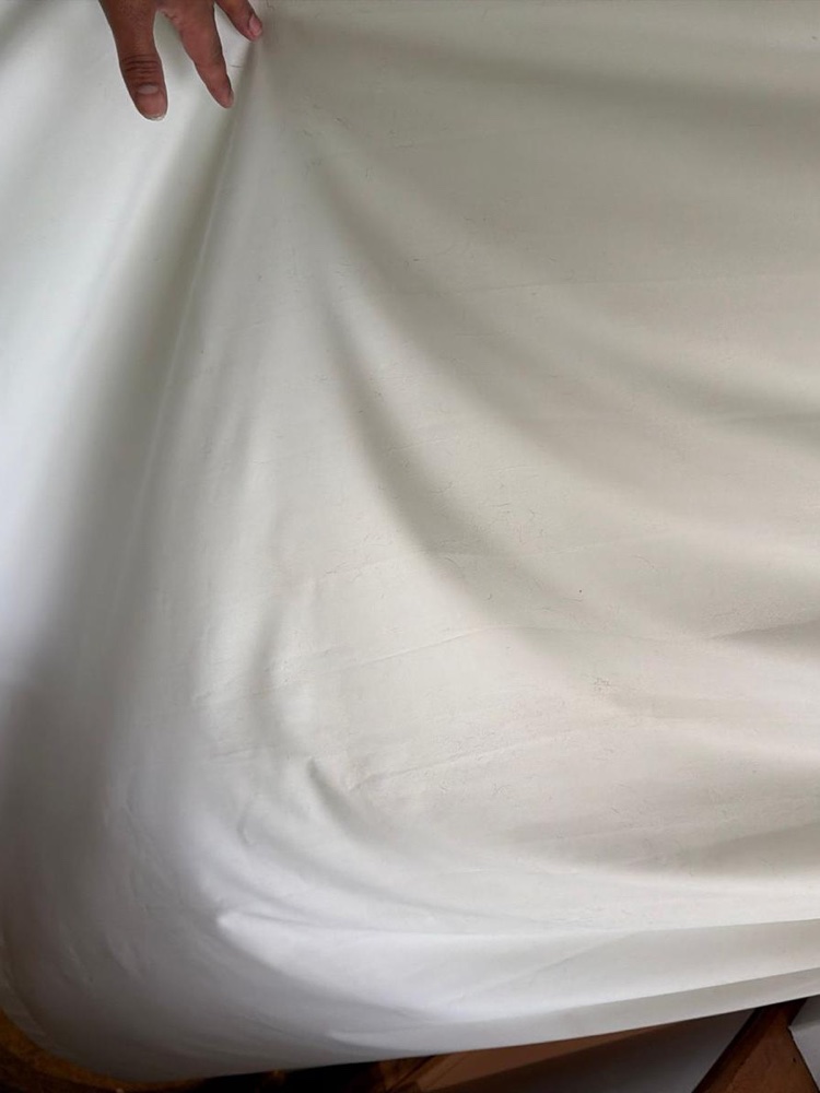 Freshly cleaned white curtain, bright and stain-free