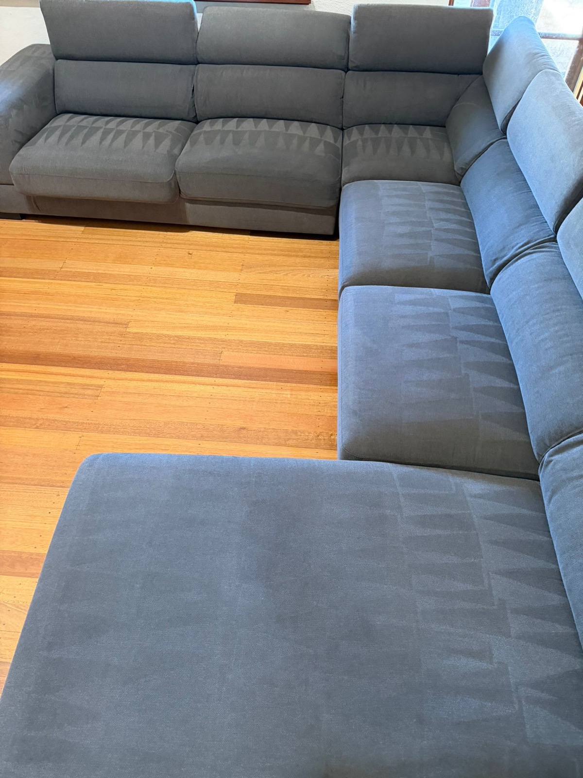 Professionally steam cleaned couch by Scrubby Cleaning