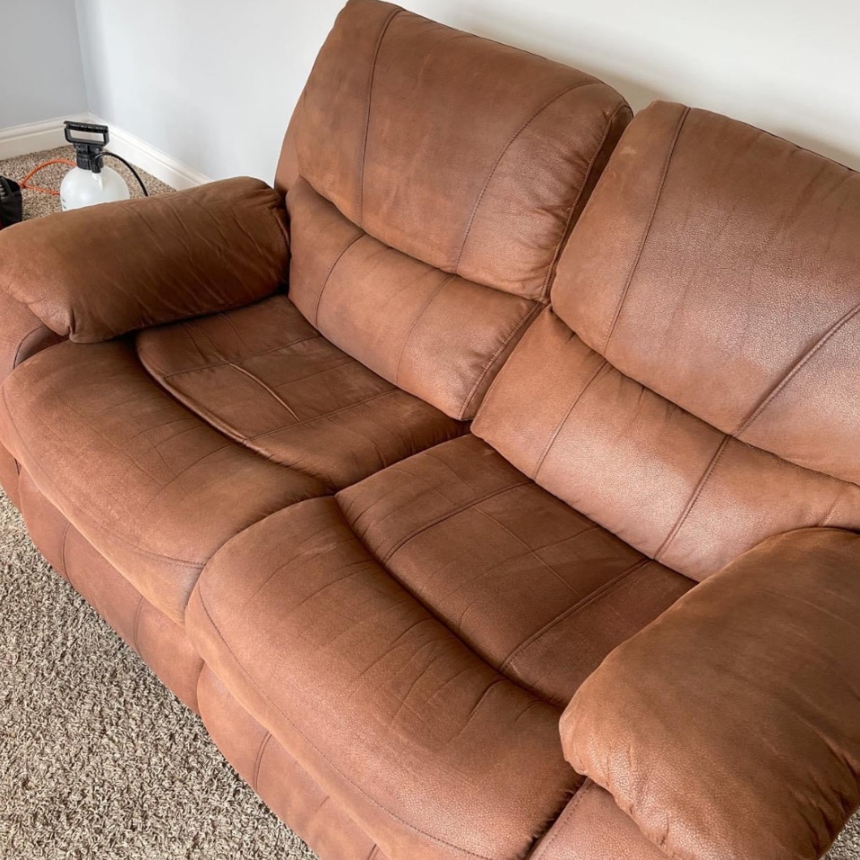 Tan leather recliner lounge after cleaning and conditioning