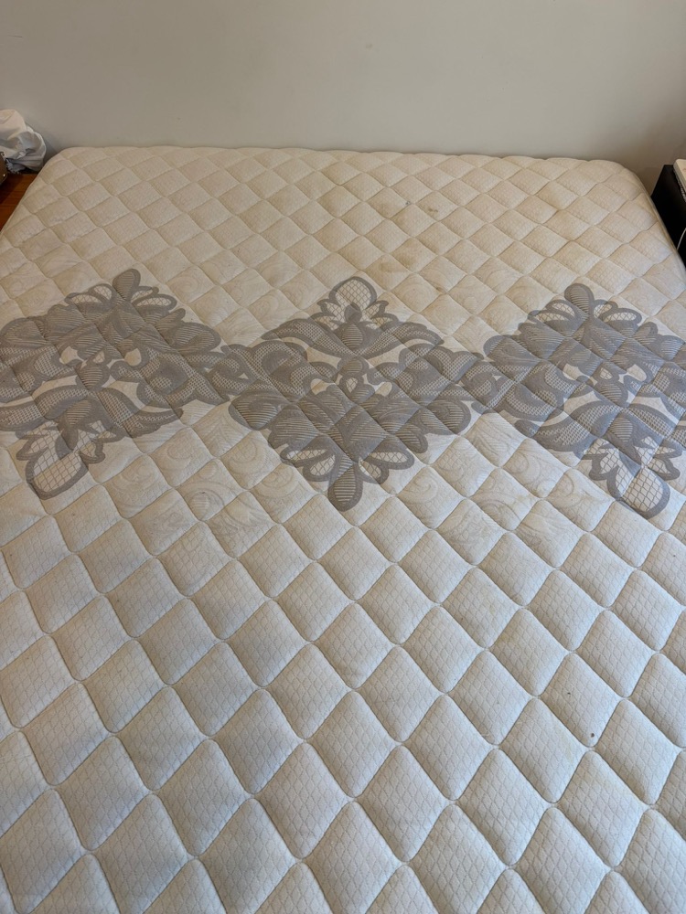 White mattress sanitised after steam cleaning