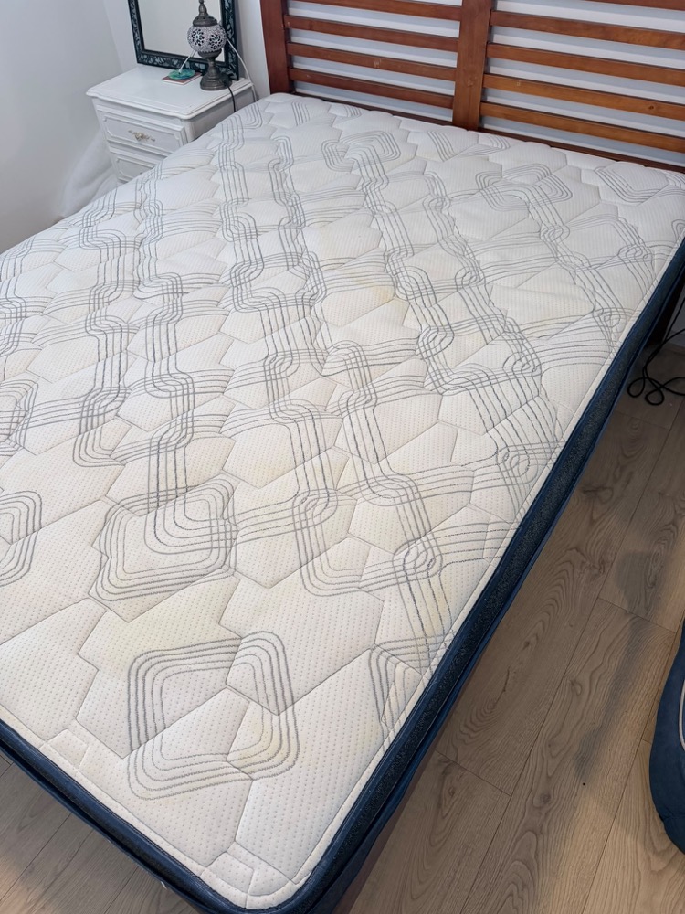 Quilted mattress before steam cleaning and sanitisation