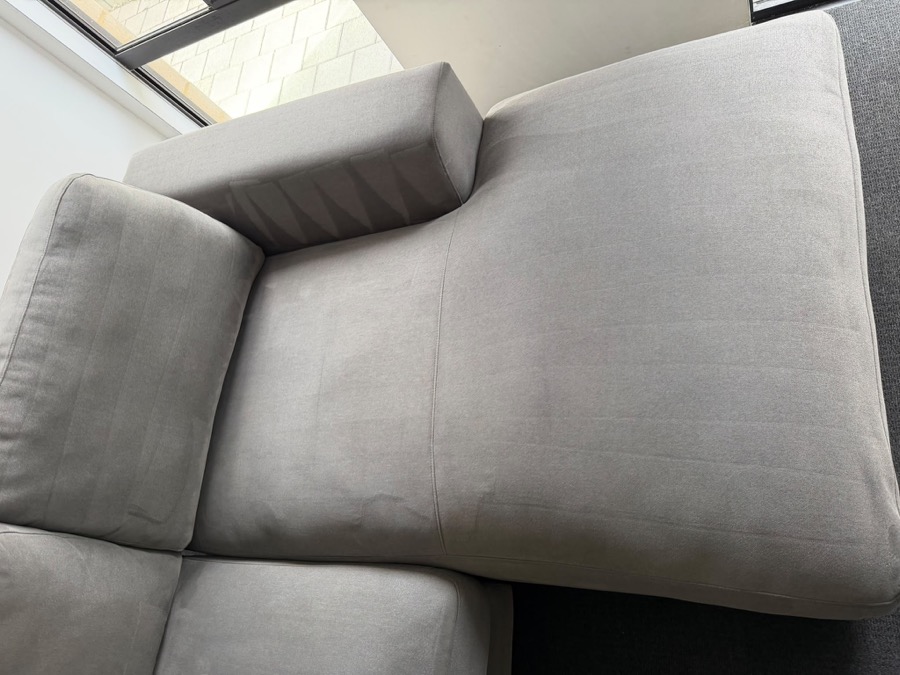 Grey chaise lounge after professional upholstery cleaning